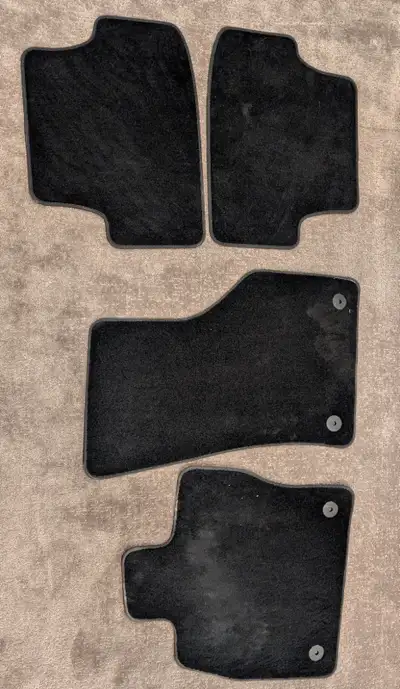 These are genuine Volkswagen felt floor mats. Very lightly used. Anti slip texture on back, and snap...