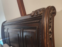 King size sleigh bed with matching night tables and dresser.