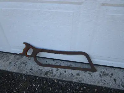 Meat cutting saw, hand saw with light coat of silver, stored inside-good for crafting----get the pai...