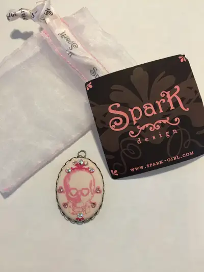 Spark design pink skull pendant, View more