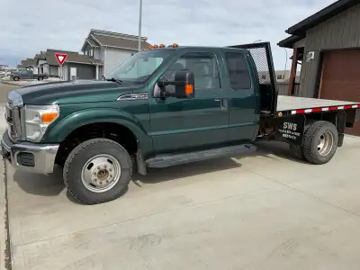 I am selling a 2011 Ford Super Duty F-350 X3D 4WD Super Cab, a robust and reliable work truck that's...