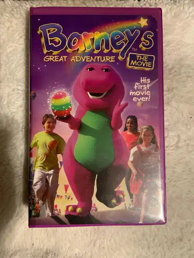 Relive your childhood with this Barney's Great Adventure VHS tape, a nostalgic trip back to 1996, in...
