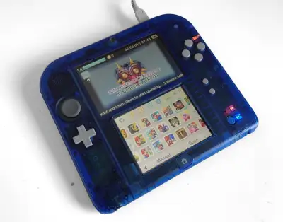 Clear Blue Nintendo 2DS with 110+ 3DS games, View more