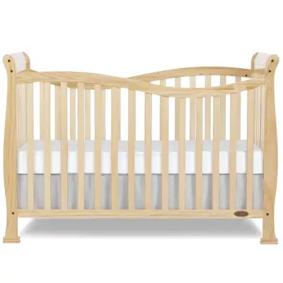 Convertible crib, natural finish. Solid wood construction. Converts to toddler bed. Includes mattres...