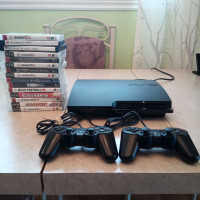 PlayStation 3 complete system + 15 games 2 controllers