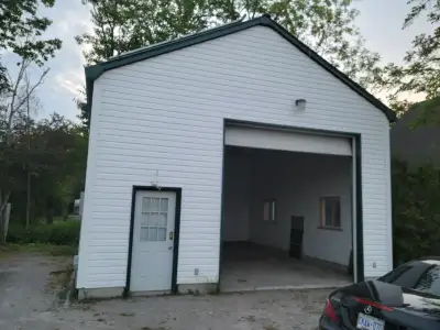 Large 24x28 foot workshop / garage for rent. Very high ceilings. Bolts on the ground already if you...