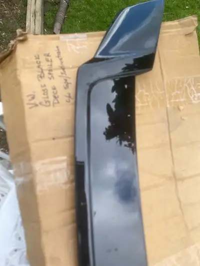 V.W. Gloss black deck spoiler not sure for what year . I believe mid 2014 I think