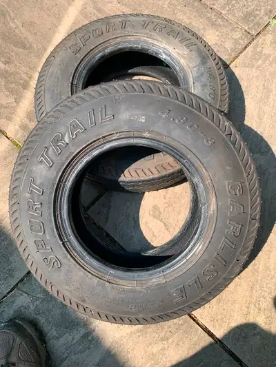 Like New driven less than 1,500 kilometres Carlisle Sport Trail utility trailer tires