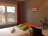A bedroom with furniture, near Rapid de la Chine LaSalle