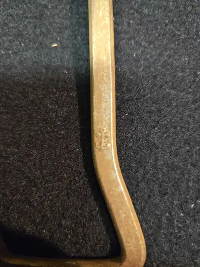 Antique boot puller. Has a small anchor stamp in metal. Located in Elora