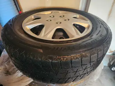4 Premium Bridgestone Blizzak WS80 Winter Tires for sale. Mounted on the steel rims already, balance...