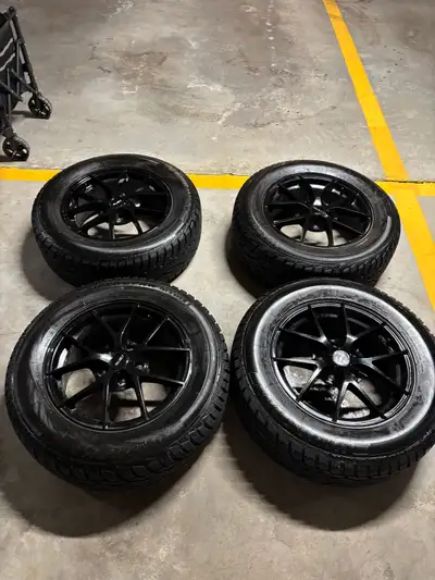 Four Uniroyal Tiger Paw Snow and Ice Tires. 215/65/R16 from a Nissan Qashqi/Kicks. Only used for thr...