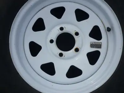 2 trailer wheels excellent condition - one tire is good for a spare