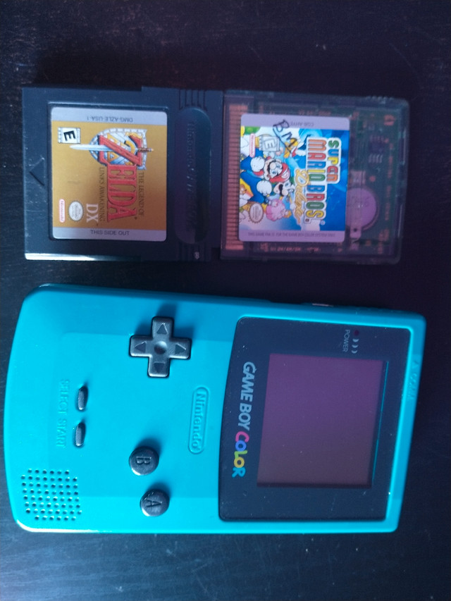 Gameboy Color + Zelda and Mario in Older Generation in Red Deer