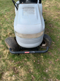 Lawn tractor parts. Hood, 6 speed rear end, bumper.