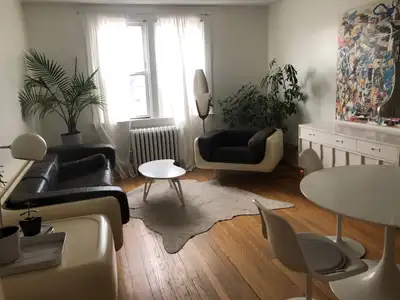 Groovy one bedroom apartment + office/loft above Excalipurr Cat Café in small arts and LGBTQ-friendl...