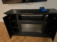Electric Fireplace in good condition! Yes it runs perfect too…!