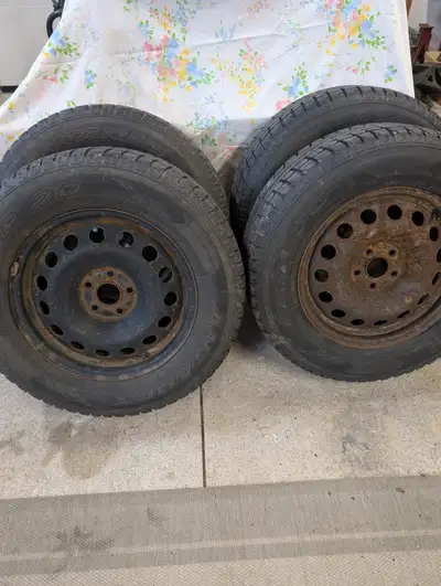 225/65/16 Antares Grip20 winter tires, tires are in great shape, lots of tread, rims are a little ru...