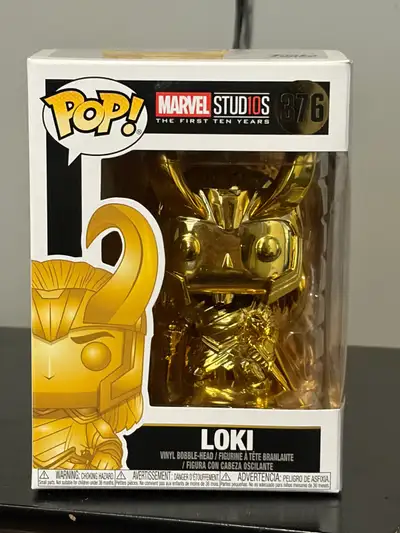 Up for sale is a golden Funko Pop! Marvel Studios Loki #376 vinyl figure, celebrating the First Ten...
