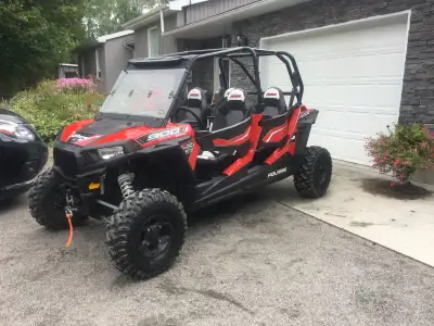 Includes: Warn winch, set of 4 Camoplast T4S tracks with mounts, Sasquatch light package with front...
