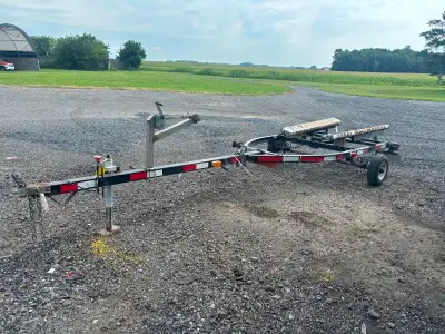 trailer for smaller jet, ski or small fishing boat. Has ownership ,lights work includes Jack. total...