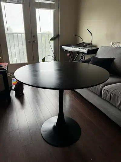 must go! Modern Black Round Tulip Dining Table, View more