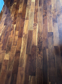 Engineered hardwood floor with wood as finishing.  