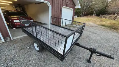I'm selling a used tilt trailer with dimensions of 8 x 6 feet, perfect for hauling various loads. Th...