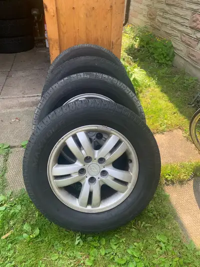 OEM rims for Hyundai Tucson with MaxTour all season tires. 235/60R16 Asking 399 OBO