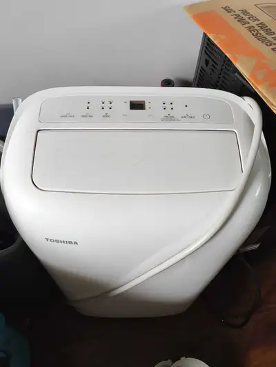 Portable air conditioning unit. Comes with hose attachments and wall attachment. Can function test w...