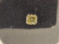 Natural Fancy yellow colour diamond.  .75CT
