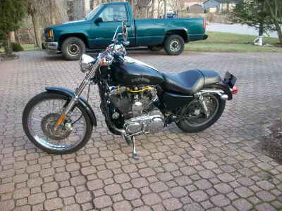 In good running order. Comes with shop manual, stock mufflers and cover. Stored inside. Regular oil...