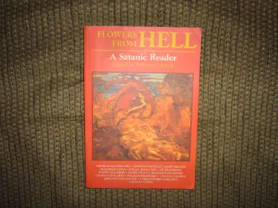 HEY FOR SALE IS A COPY OF FLOWERS FROM HELL A SATANIC READER BY NIKOLAS SHRECK. IT IS IN EXCELLENT C...