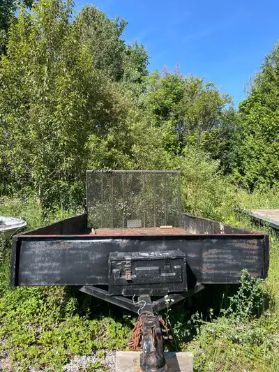 I'm selling a used 14-foot utility trailer, perfect for hauling equipment or materials, with a sturd...