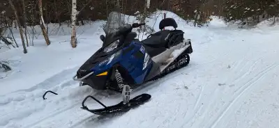 Priced to sell!!! Excellent condition! 144 inch Studded track is in great shape. 550cc 2 stroke fan...