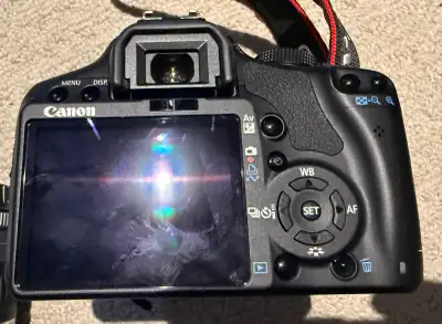 This Canon EOS 550D is great for beginner photographers. It comes with two lenses: a Canon Zoom Lens...