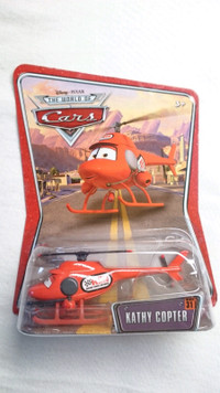 DISNEY PIXAR WORLD OF CARS KATHY COPTER RSN  DIECAST MINT RED