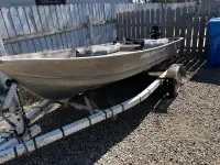 12 foot aluminum boat w/trailer and motor