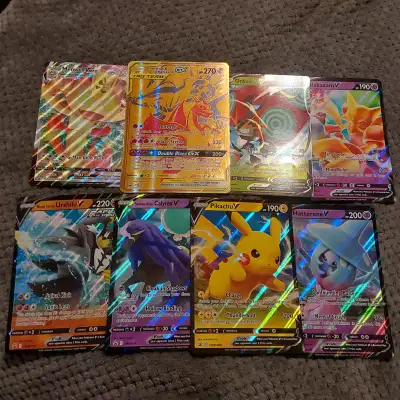 Pokemon Jumbo cards, Pikachu, Reshiram & Charizard, Meowth vmax, View more