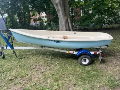 Sailboat with oar locks, dagger board, rudder, tiller, mail sail, jib and all the rigging, with trai...