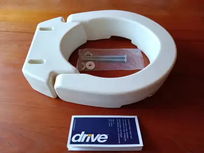 -Hinged Toilet Seat Riser -Raises the toilet seat height 3.5 in. to make it easier to get down or up...