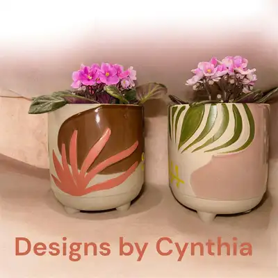 Two beautiful Ashland Arizona themed identical high quality indoor plant pots with feet and holes in...