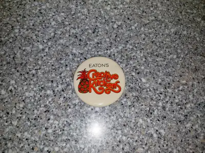 Vintage Eaton's advertising pinback button (1970's), View more