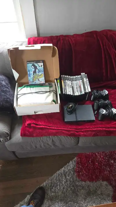 PS2 console with games, View more