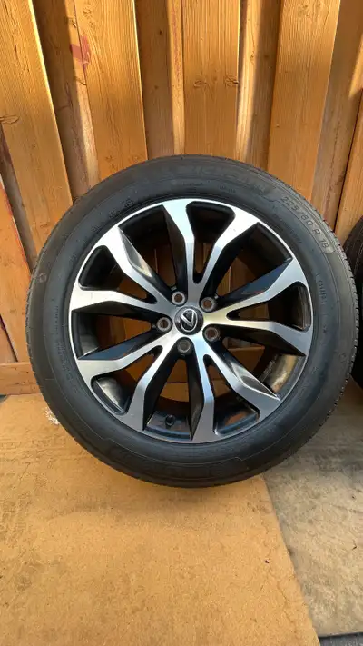 Selling a set of four Michelin Primacy A/S tires mounted on Lexus rims, size 225/60R18, in used cond...