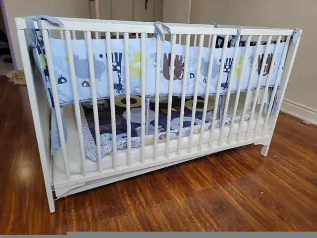 IKEA SOLGUL Crib with mattresses, blank and side cushion. in Cribs in Mississauga / Peel Region - Image 6