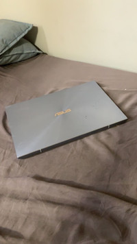 lightly used asus zen book 