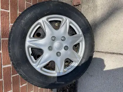 used Michelin x ice 225/60 R 17 in snow tires on a Subaru forester with steel rims and hub caps. set...
