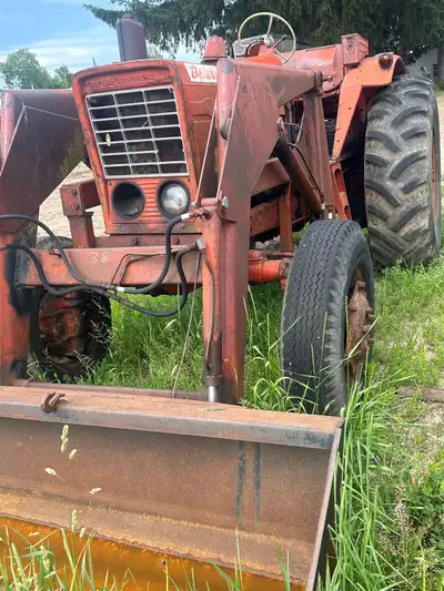 Belarus four-wheel-drive loader tractor for sale with brand new tires to go with it for the front an...