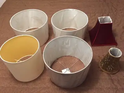 Seven of them drum shaped - all new and only $ 40 each 2 white - 12" diameter - 9" high 1 steel gray...